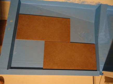 Gepuzzel om zoveel mogelijk hele tegels op de 3 vlakken te krijgen